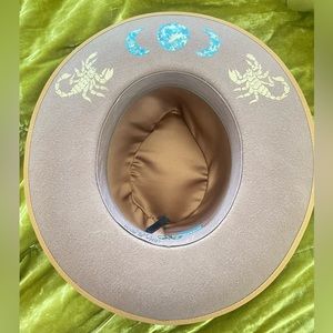 Brown olive and pique hat hand painted by Luna bloom